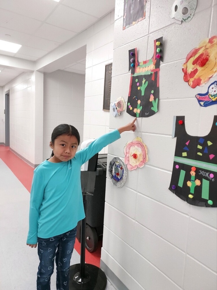 Students led the way in creating Hispanic-inspired art pieces!